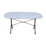 Restaurant bistro table in oval marble and decorated cast iron bases -1m51
