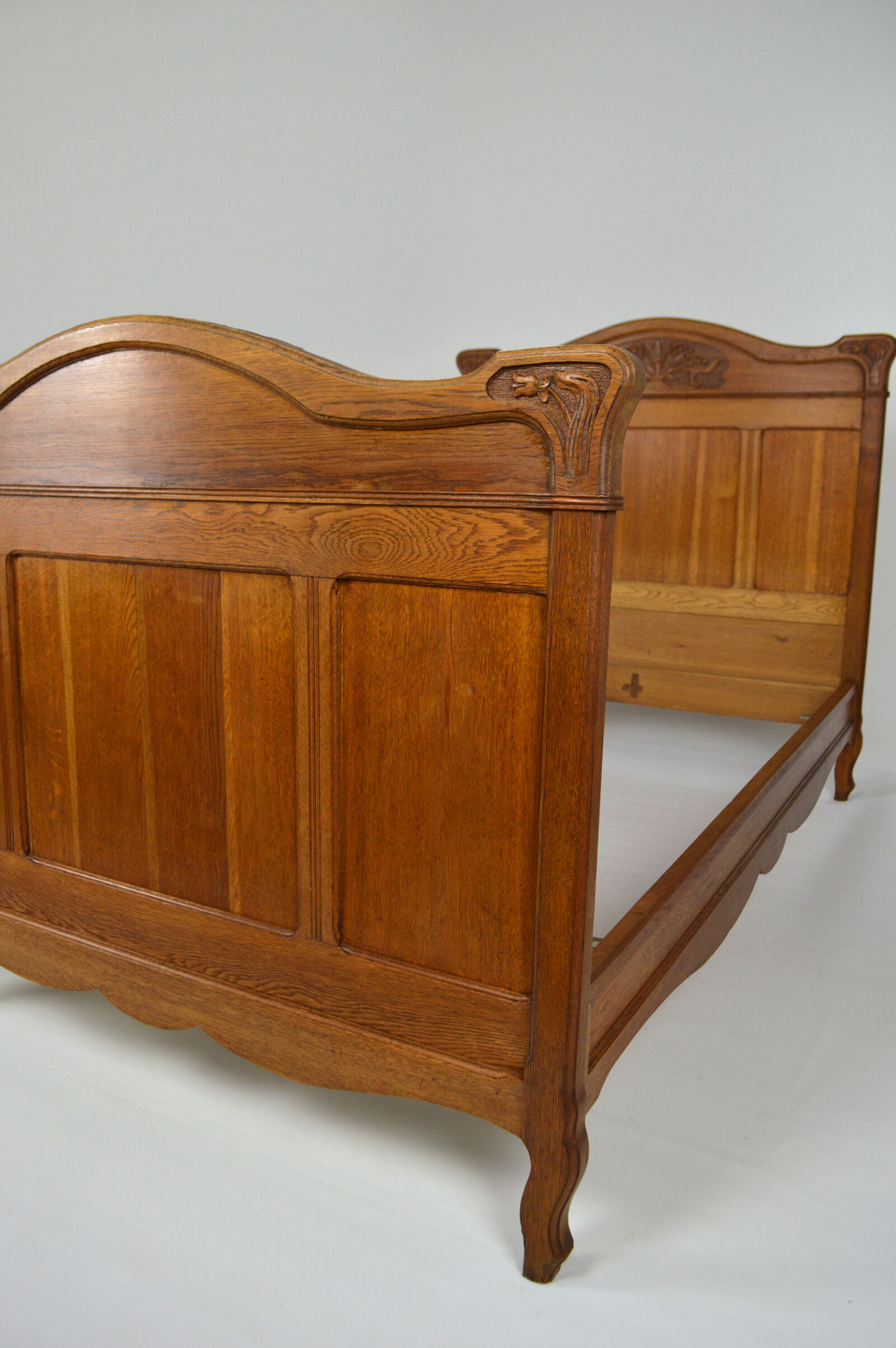 Art Nouveau twin beds in carved solid oak, France, circa 1910