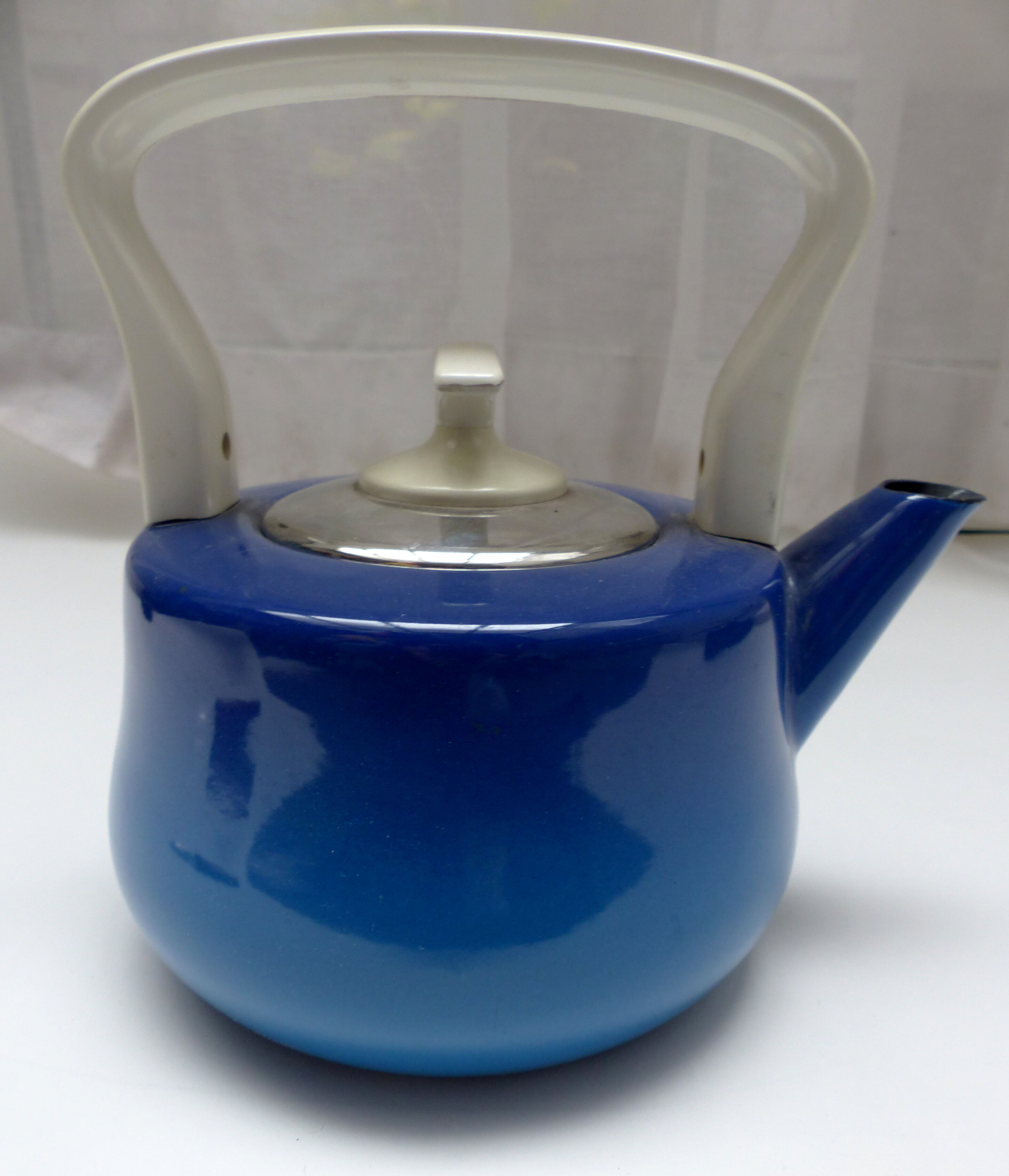Old blue enamelled kettle