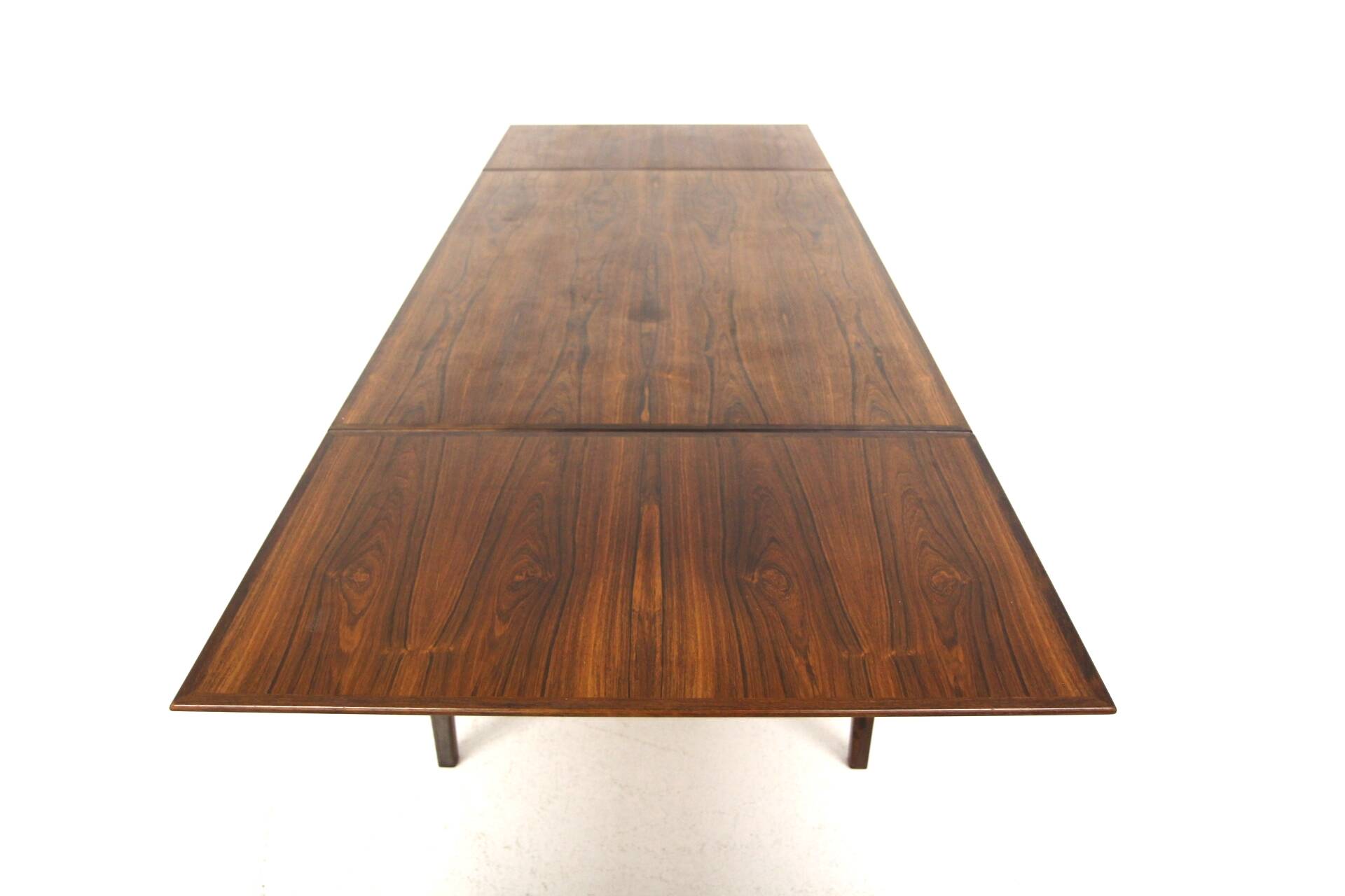 Rosewood “portfolio” dining room table, Sweden, 1960s