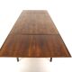 Rosewood “portfolio” dining room table, Sweden, 1960s