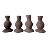 Four vintage handcrafted candle holders