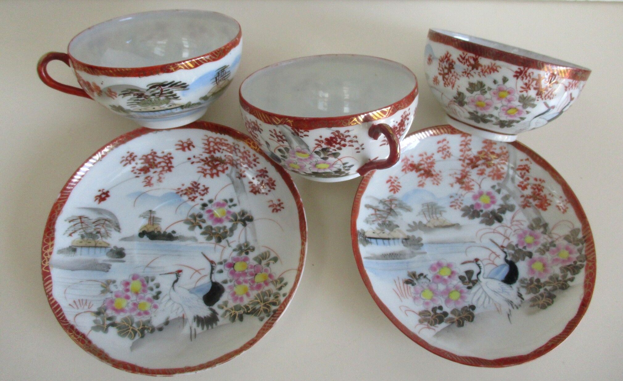 Antique cups and under cups porcelain japan