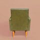 Vintage children's armchair in green skai