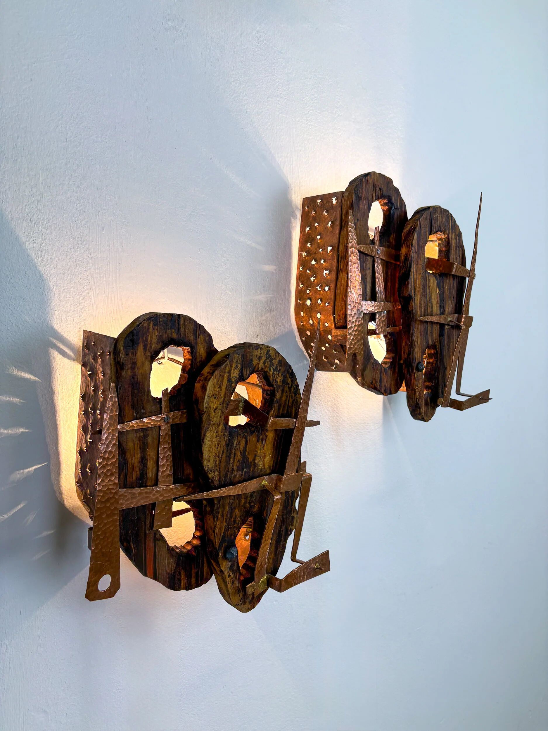 Pair of Brutalist wood & copper wall sconces, Italy, 1970s