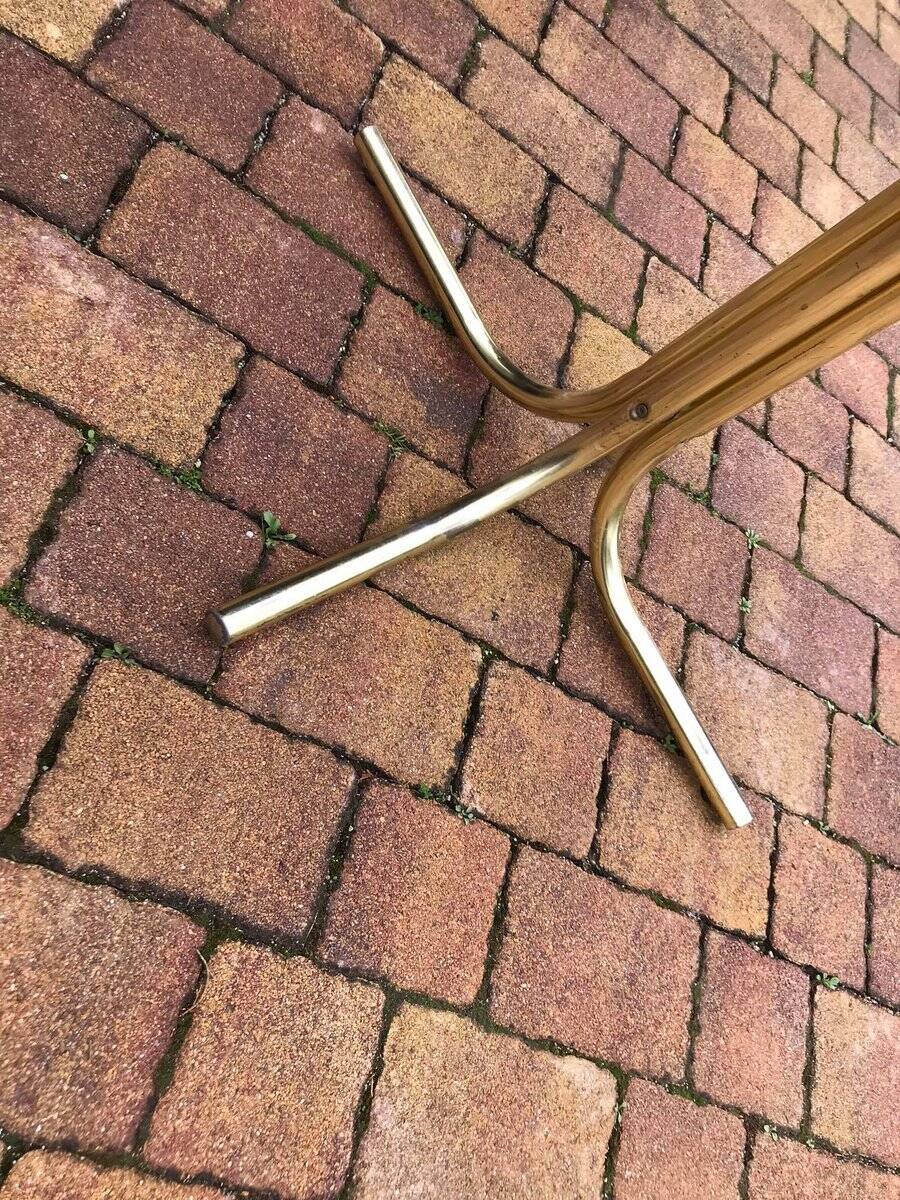 Octagonal table in brass and glass, brown and straw yellow — Hollywood Regency style.