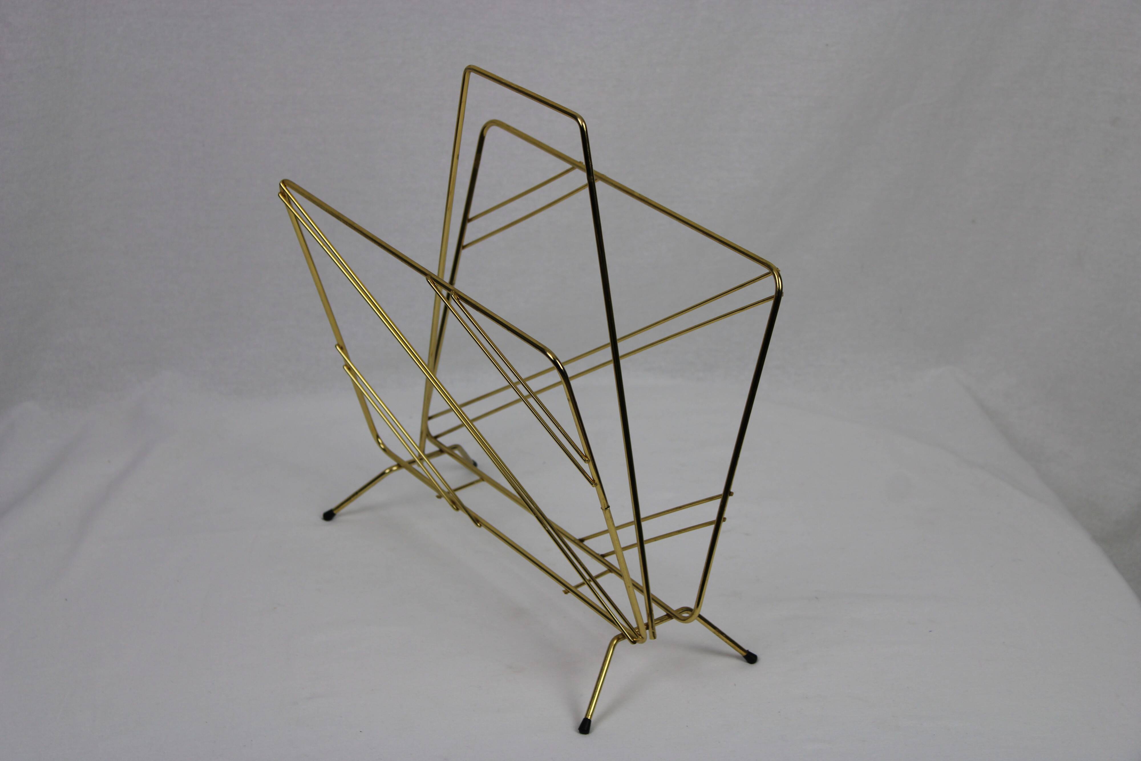 Gold metal magazine holder