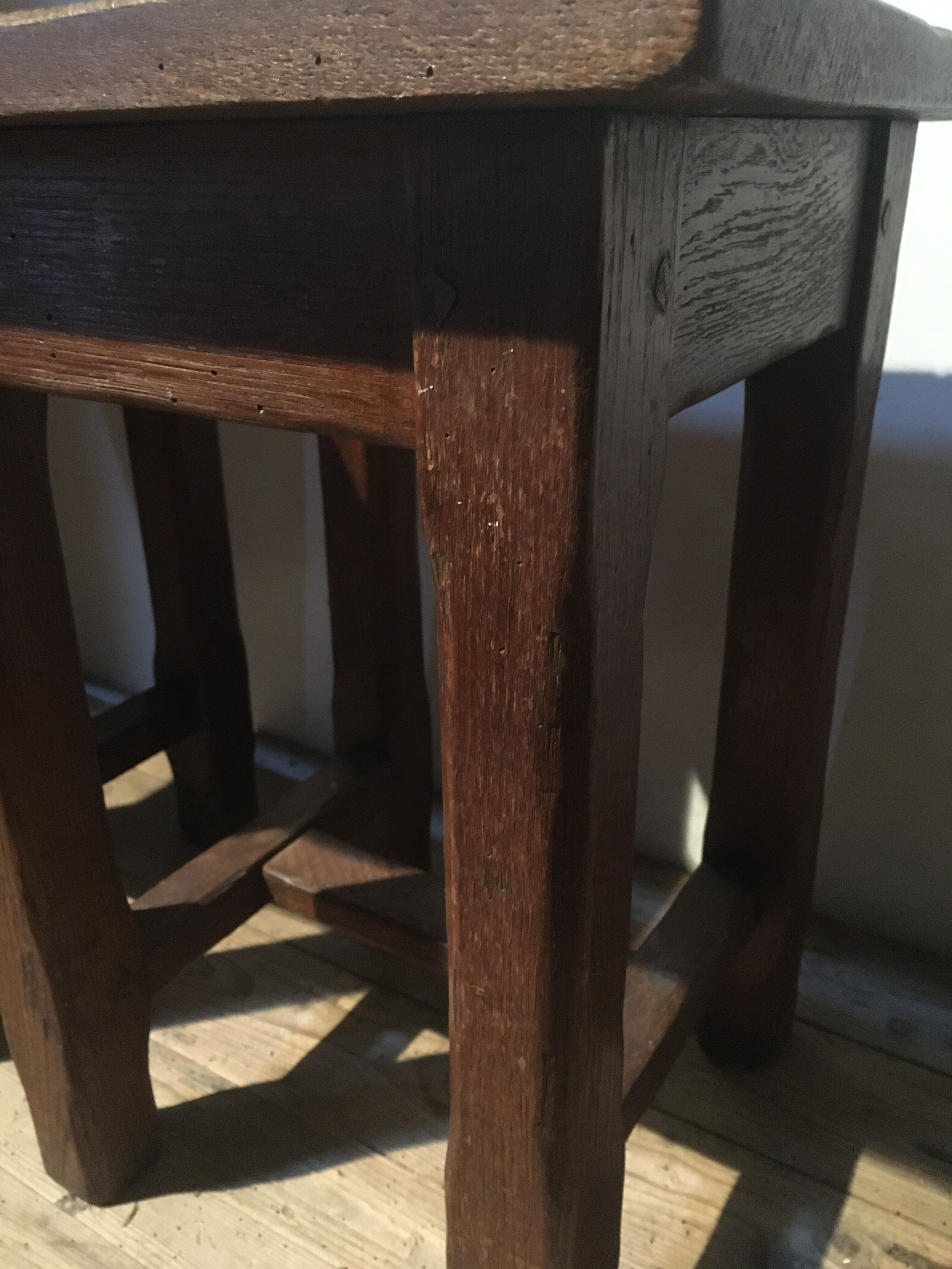 Low stools made of rustic oak