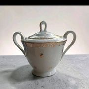 Teapot and sugar bowl in gilded Limoges porcelain by Chastagner & Co.
