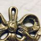 Fronton old "knot" in brass