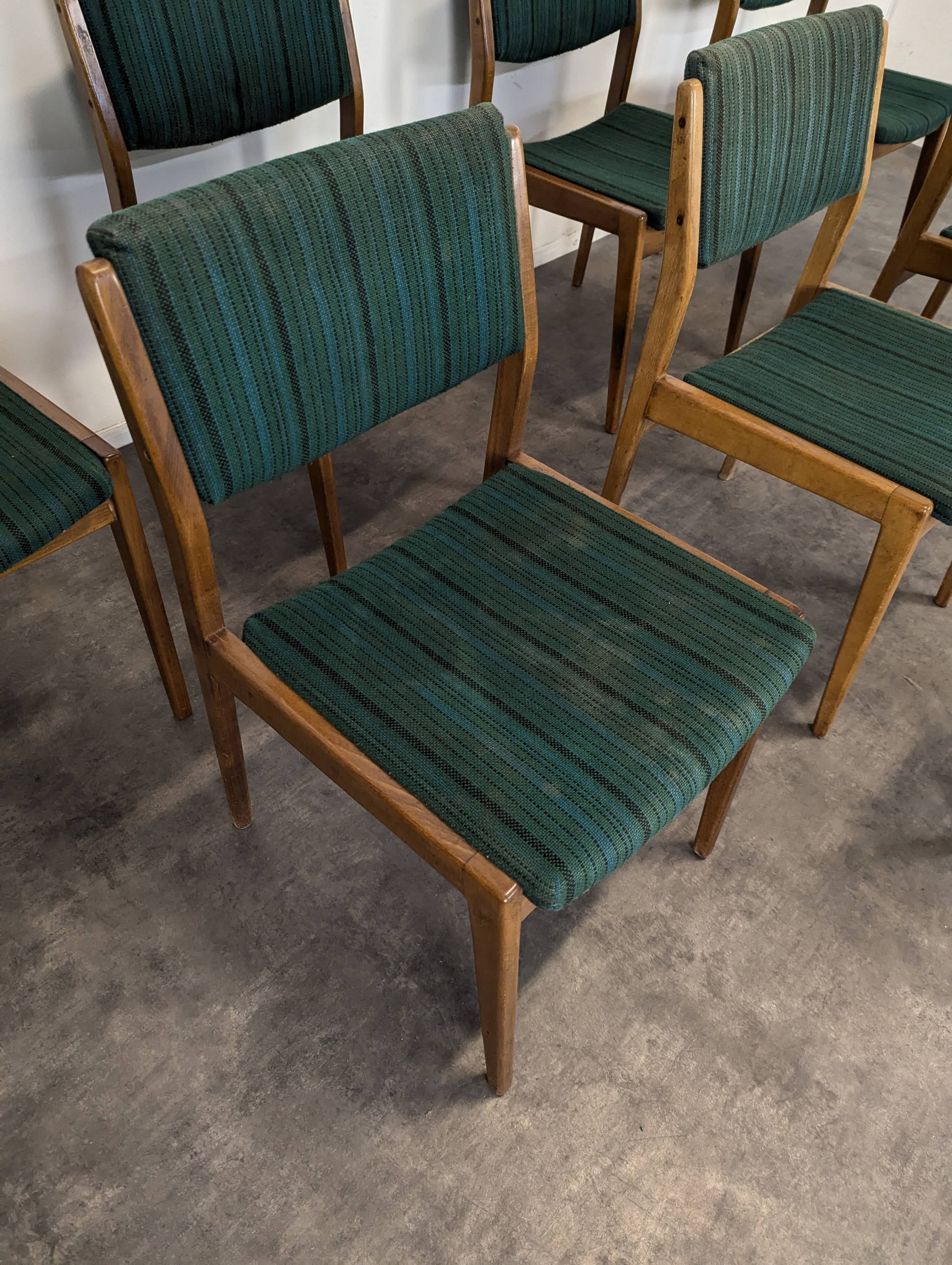 Set of 8 vintage green fabric chairs.