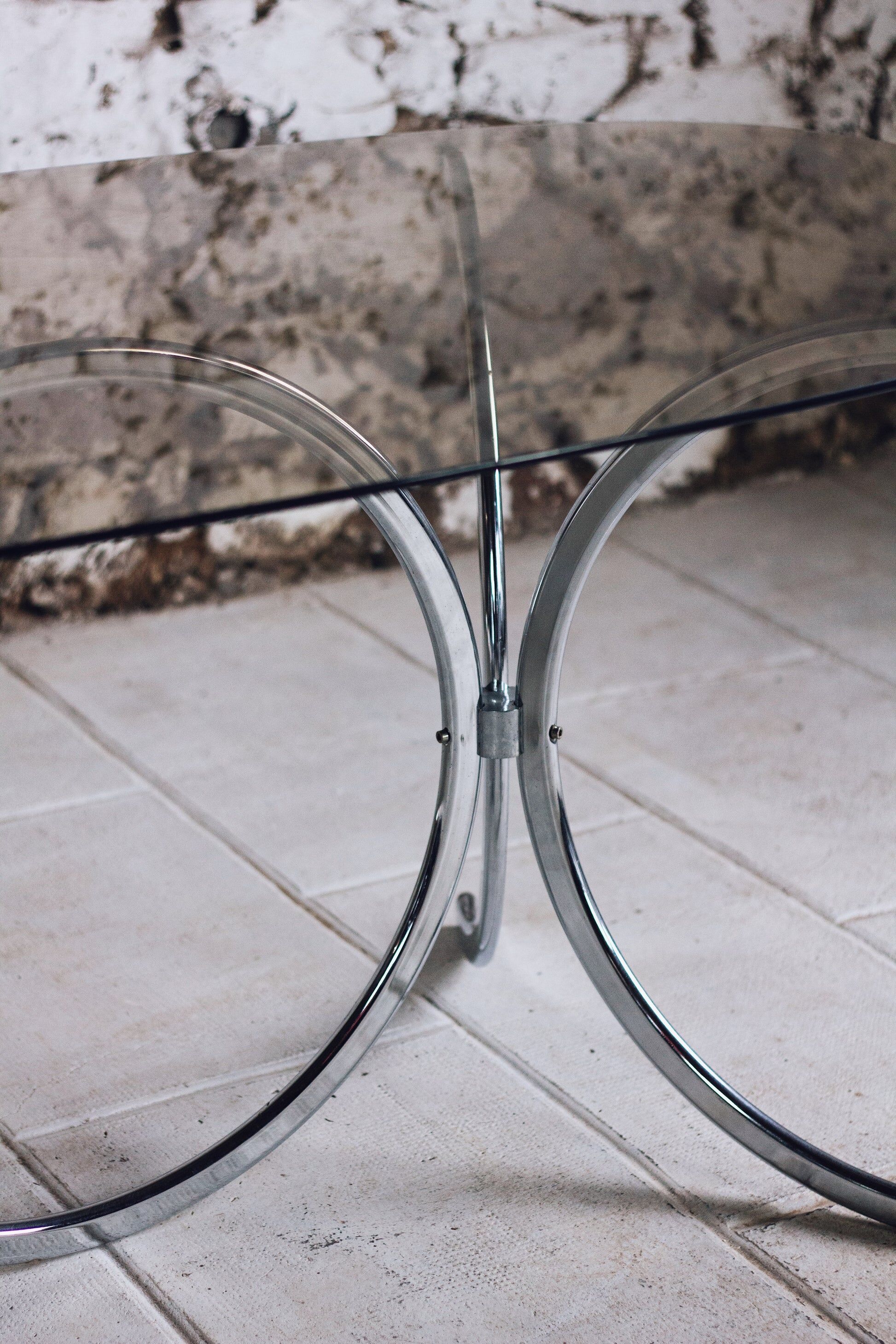 Chrome and smoked glass dining table in the style of Gastone Rinaldi, 1970.
