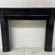 Napoleon III period fireplace with a black marble corbel. 19th century.