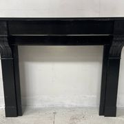 Napoleon III period fireplace with a black marble corbel. 19th century.