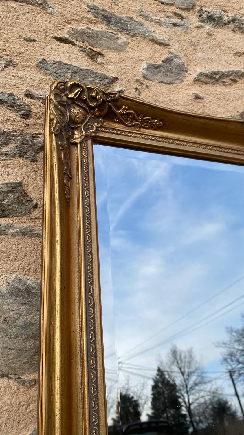 Large gilded carved wooden mirror