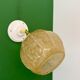 Vintage yellow glass globe wall light