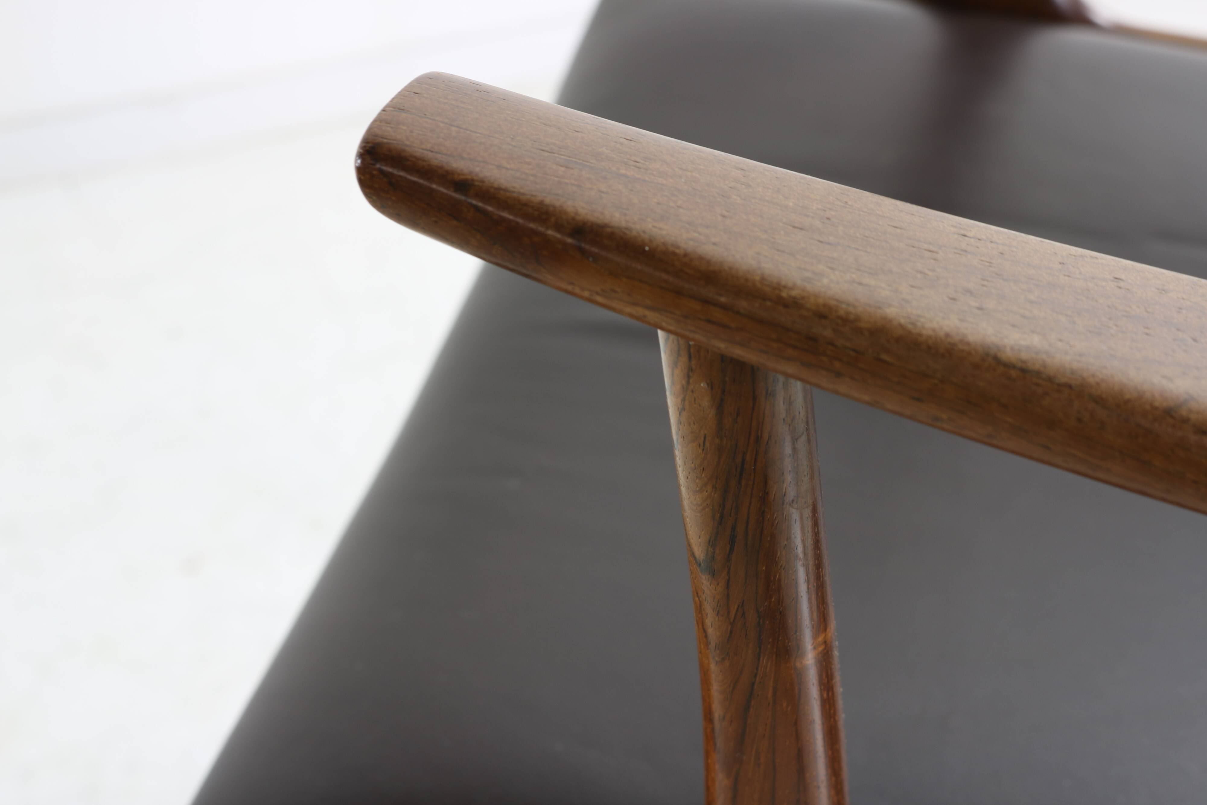 Grained rosewood danish design armchair by Johannes Andersen