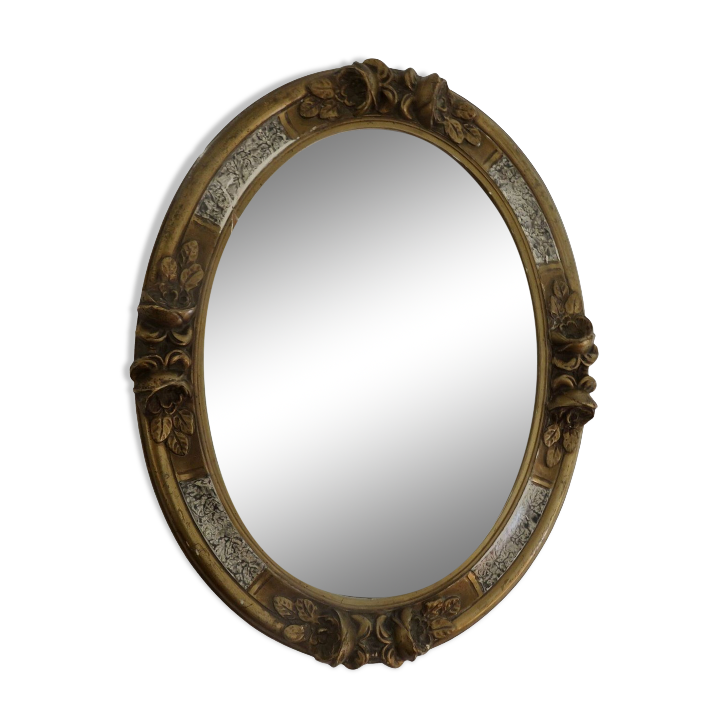 Oval wall mirror, golden floral pattern in stucco and wood, late 19th century
