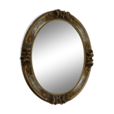 Oval wall mirror, golden floral pattern in stucco and wood, late 19th century