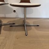 Lot of 4 vintage swivel chairs in the style of Arne Jacobsen.