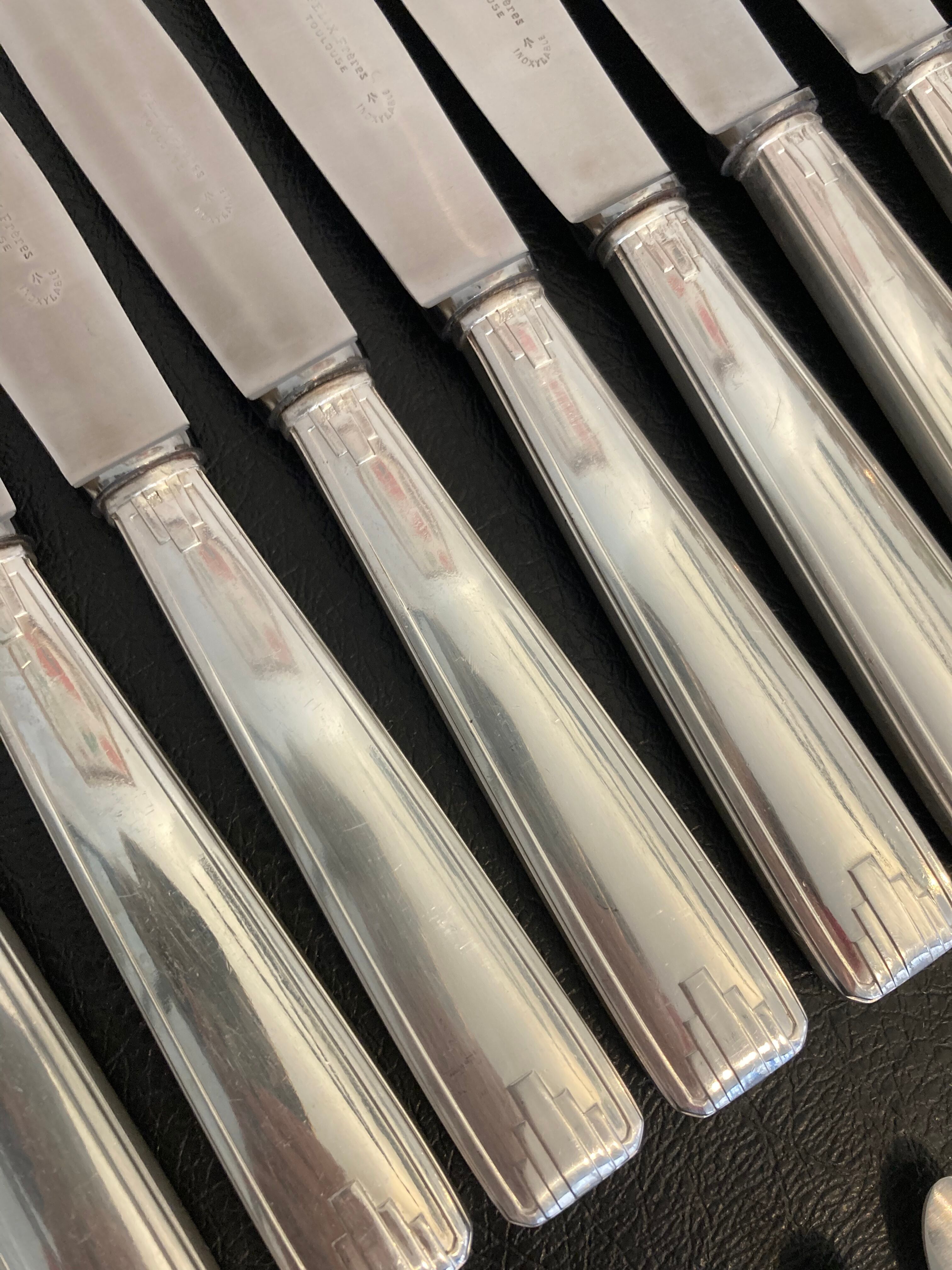 Set of 24 silver metal knives art deco