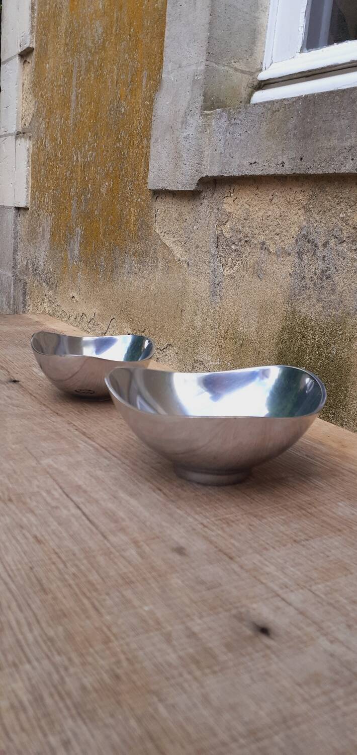 Pair of cast aluminum cups, 1970s