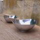 Pair of cast aluminum cups, 1970s