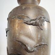 Large Art Deco vase in patinated brass, relief decoration of birds – year