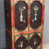 Asia, 20th century: Lacquered cabinet decorated with vases of flowers in hardstone