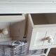 chiffonier, linen chest of drawers made of wood, wicker and fabric