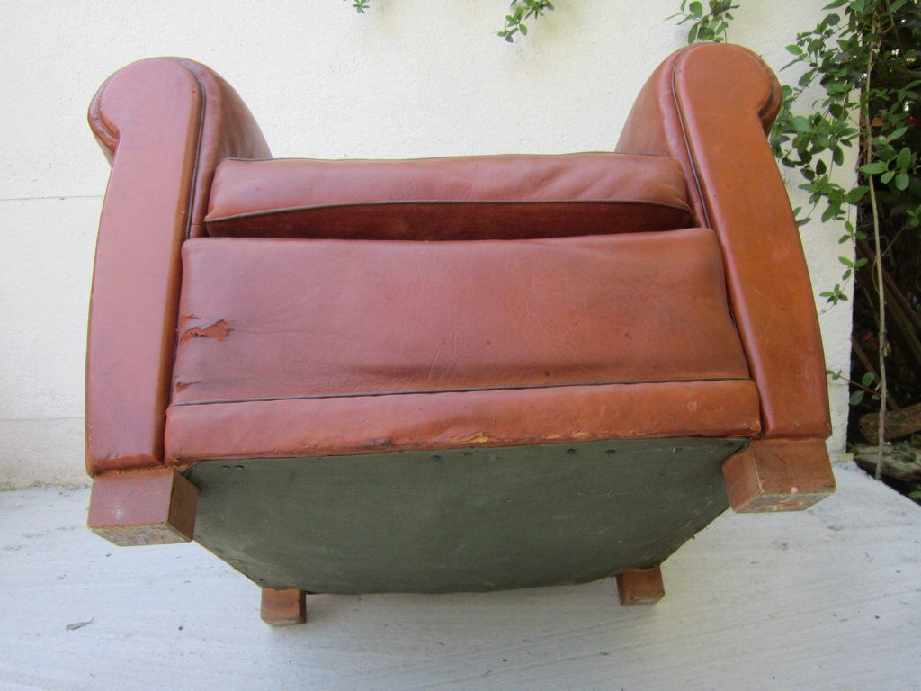 Paire de fauteuils club en cuir