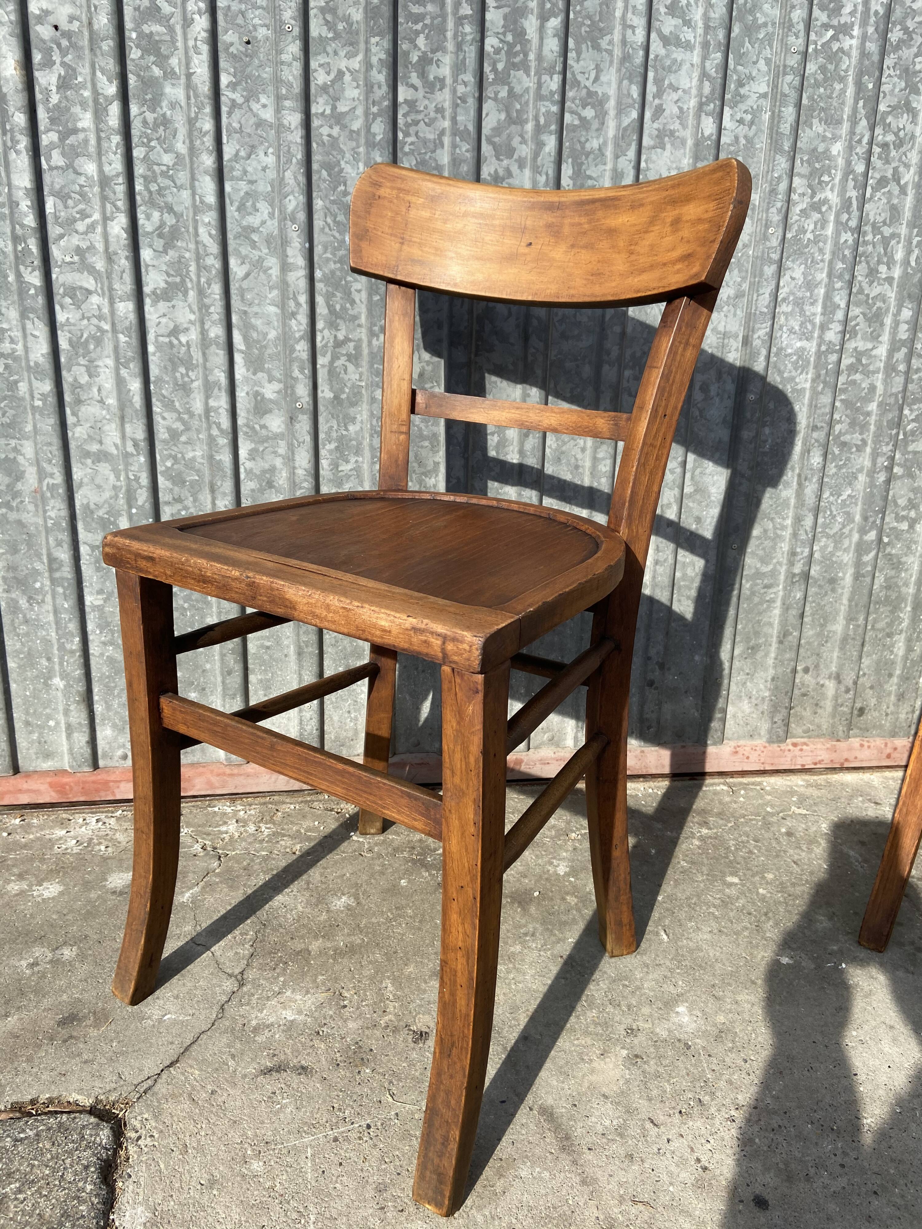 Pair of mismatched bistro chair