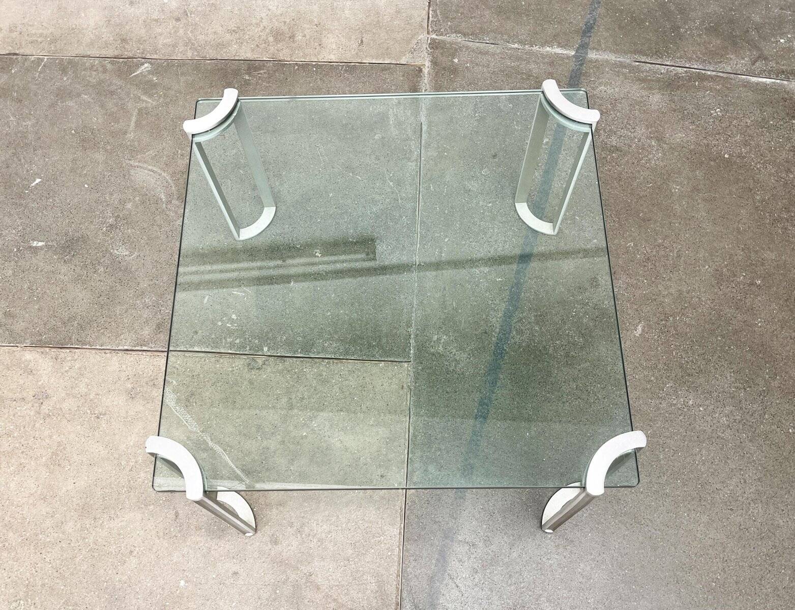 Vintage Space Age coffee table in glass and aluminium attributed to Peter Ghyczy, 1970s.