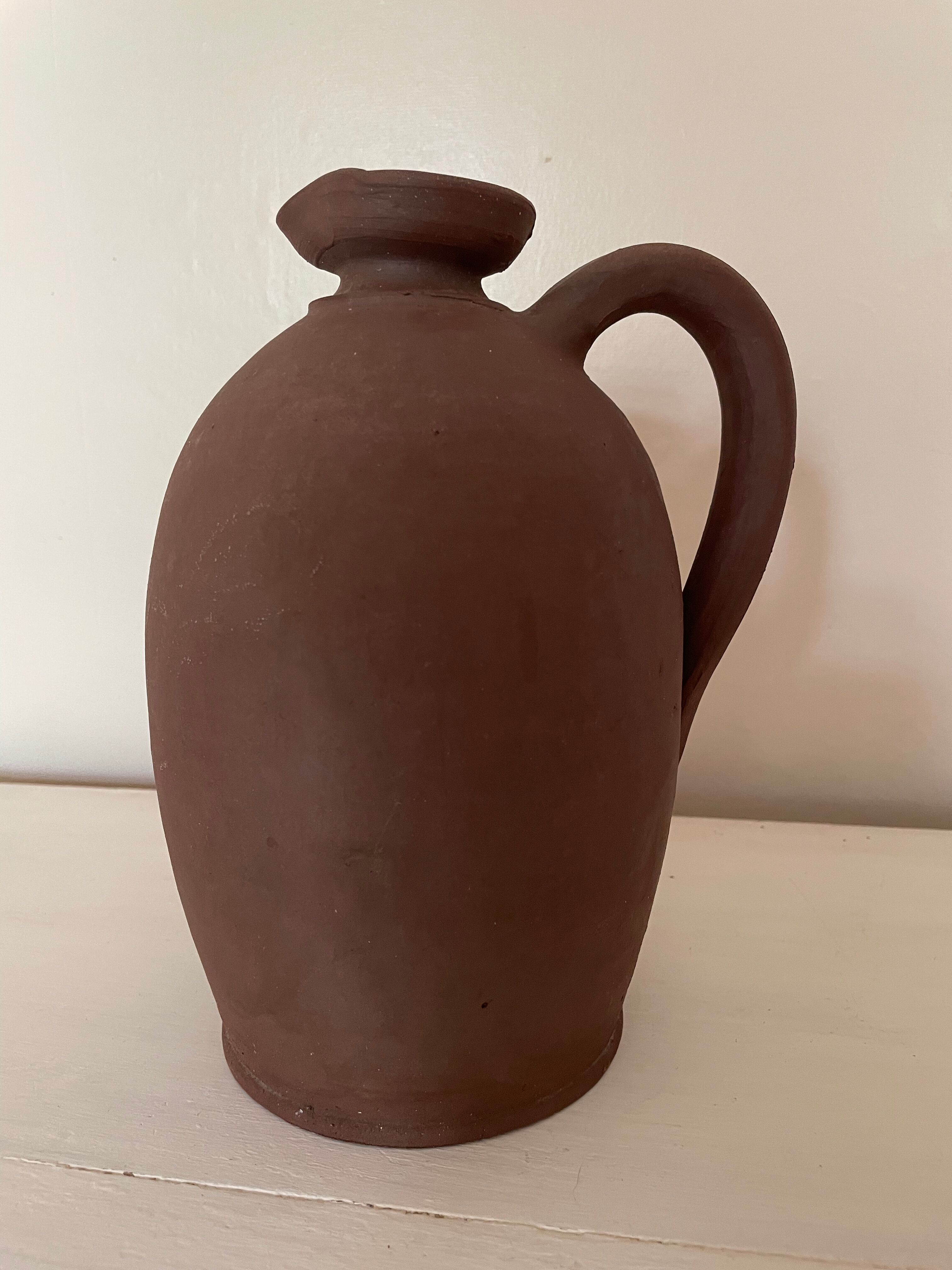 Jar and terracotta bottle