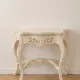 Louis XV console in carved cream white wood.