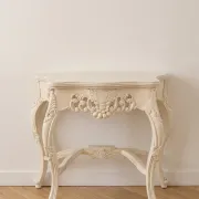 Console in Louis XV style, carved wood in off-white.