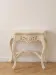 Louis XV console in carved cream white wood.