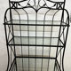 Antique wrought iron shelf