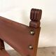 Spanish chair in leather and carved wood, 1950s/60s.