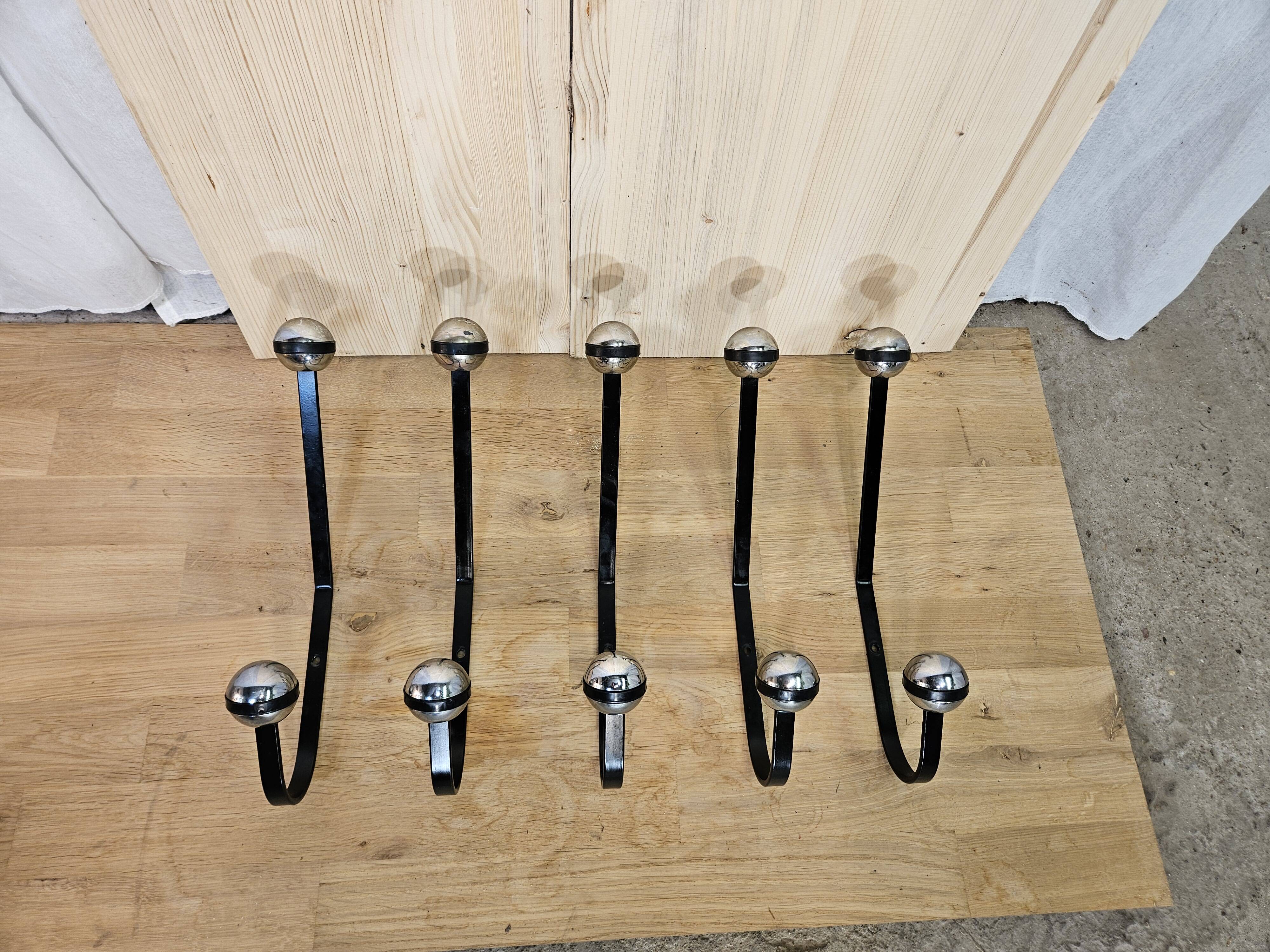 5 black and silver coat hooks from the 60s