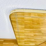 Italian asymmetrical wall mirror framed in brass 1960s Italy