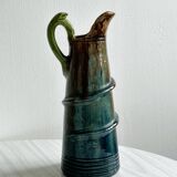 Large pitcher with frog handle.