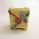 Small rose-patterned cache-pot in earthenware.
