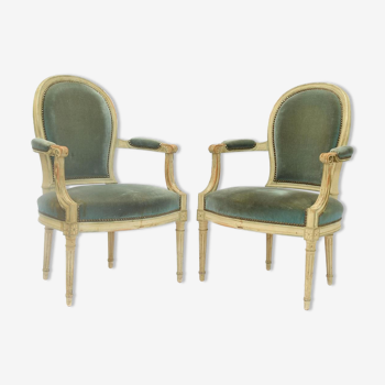 Pair of Louis XVI style convertible armchairs