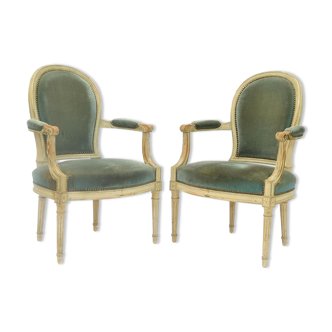 Pair of Louis XVI style convertible armchairs