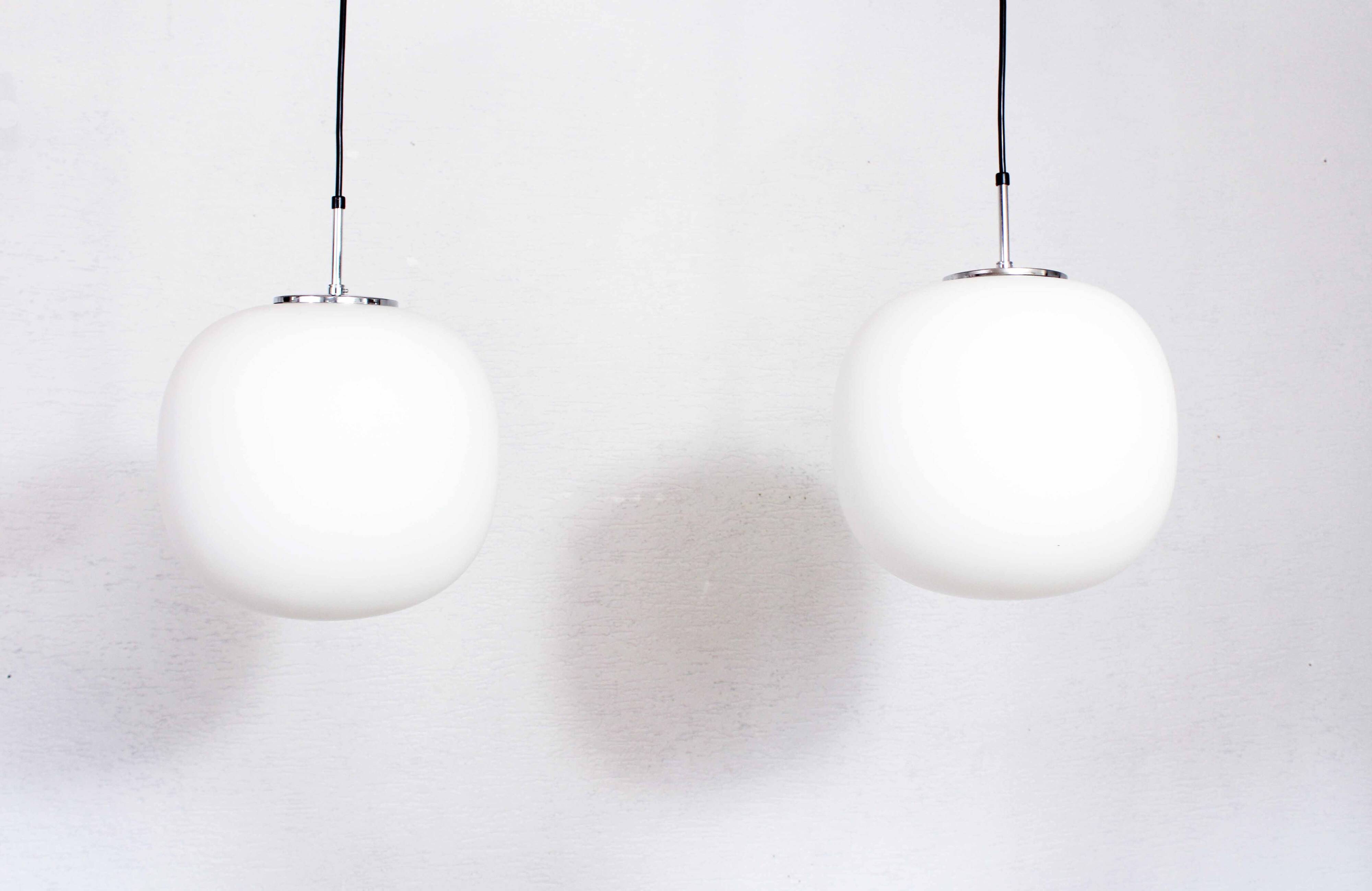 Pair of opal glass pendant lights
