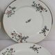 6 flat plates decorated with barbs