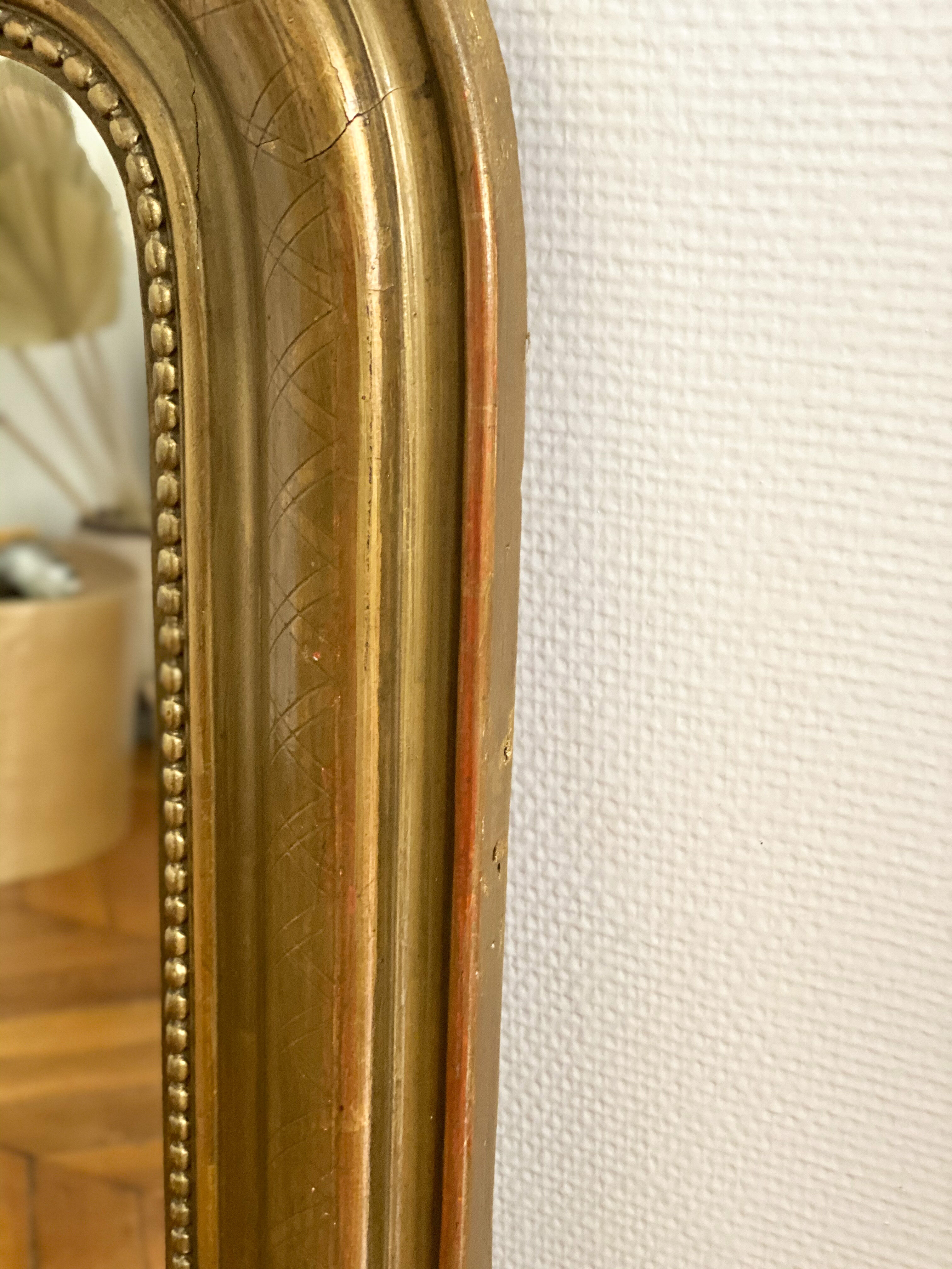 Miroir Louis Philippe perlé doré sculpté 74x98cm