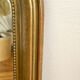 Miroir Louis Philippe perlé doré sculpté 74x98cm