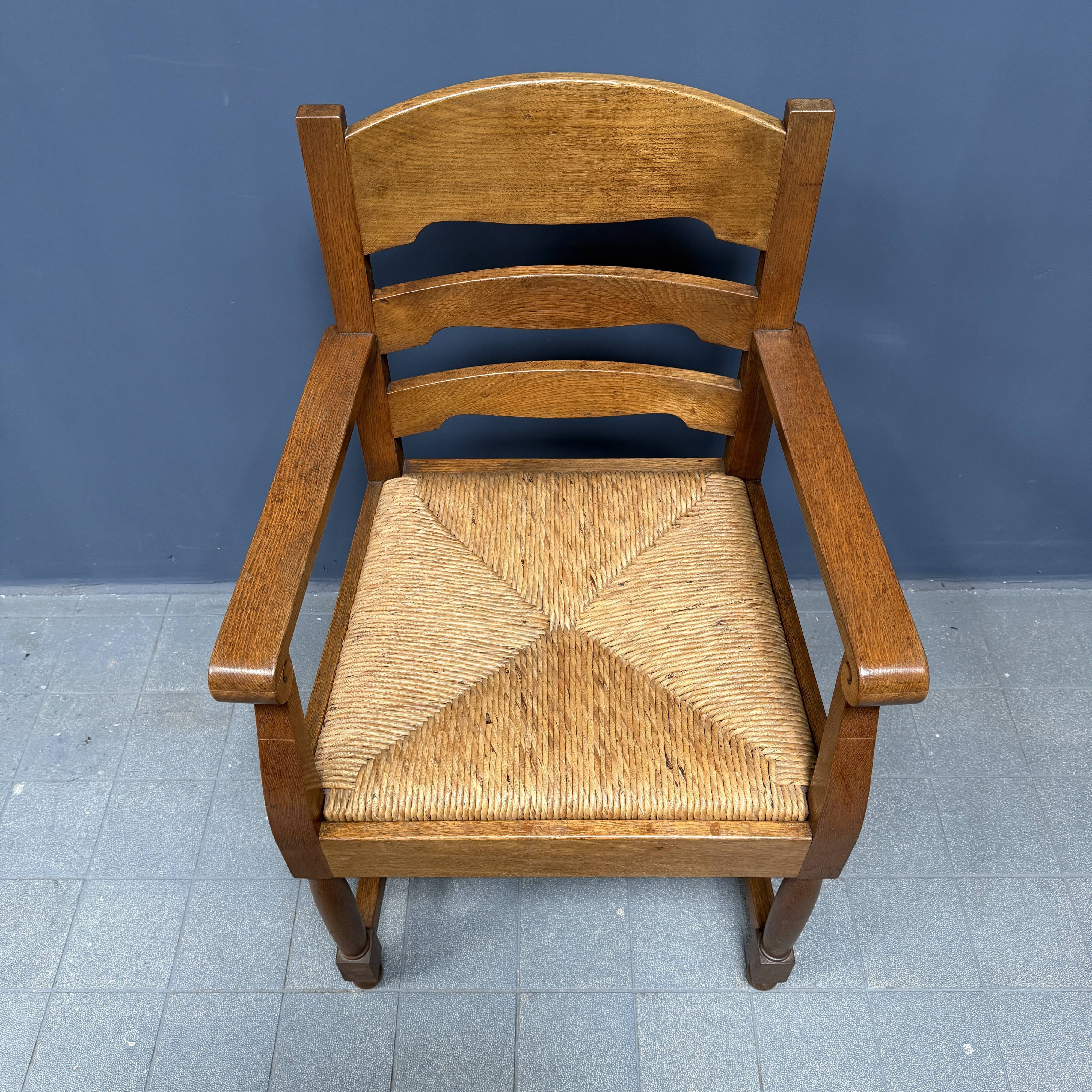 Set of two Dutch oak armchairs with rush seats